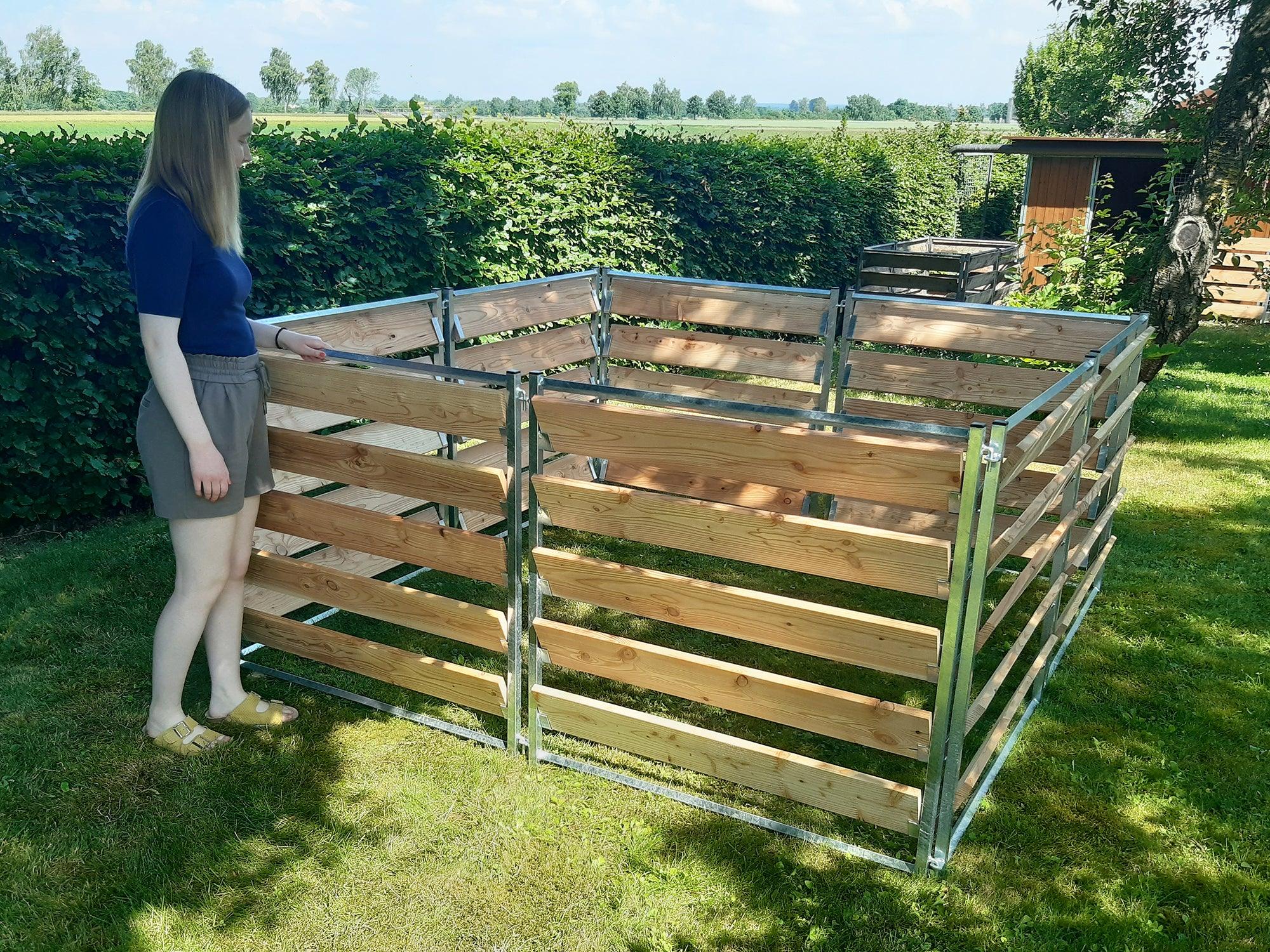 Komposter 2 x 2 m aus robusten Lärchenholz und senkrechten Stahlpfosten